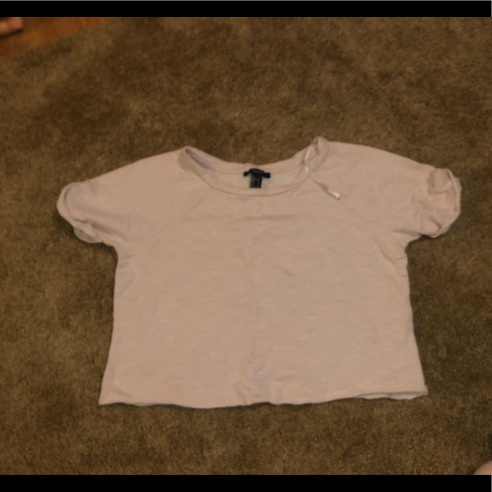 Cropped light pink shirt